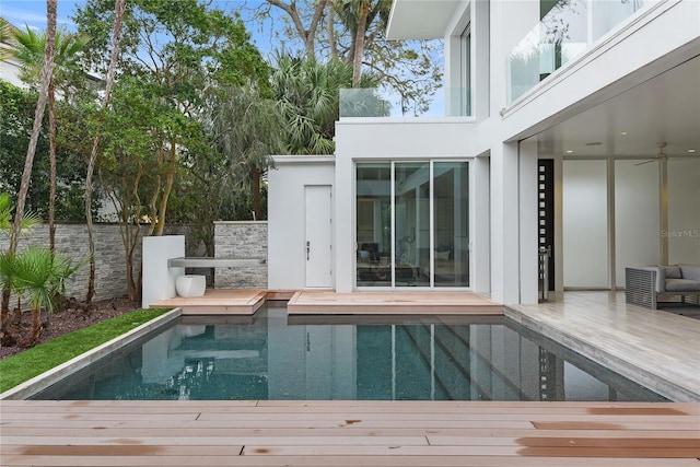 view of swimming pool featuring a deck