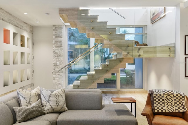 staircase with wood finished floors