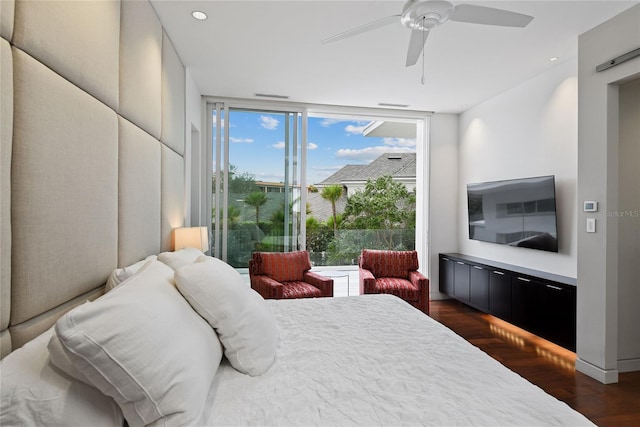 bedroom with a wall of windows, recessed lighting, dark wood-style floors, and ceiling fan
