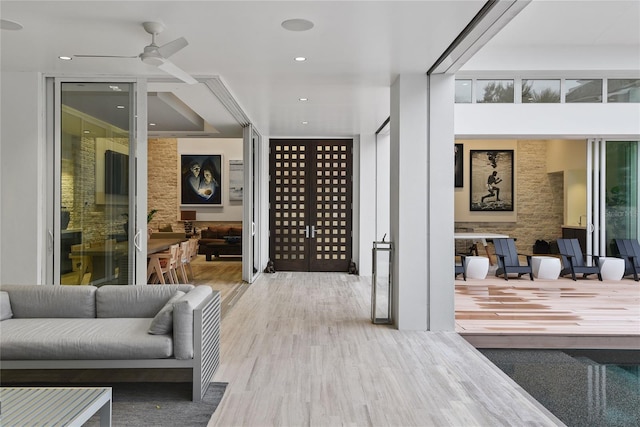 interior space with recessed lighting and wood finished floors