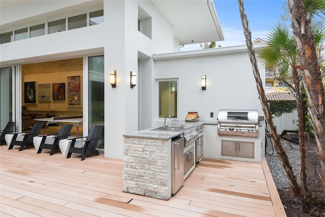 deck with grilling area and area for grilling