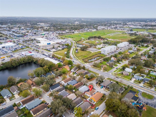 aerial view featuring a residential view and a water view