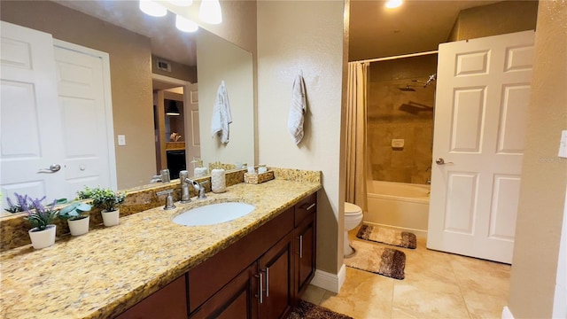 full bathroom with toilet, shower / bath combo with shower curtain, tile patterned floors, and vanity