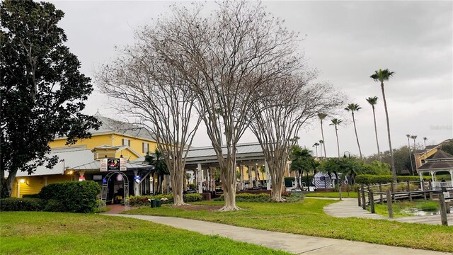 5017 City St Unit 1932, Orlando, FL 32839 - view of property's community with a lawn