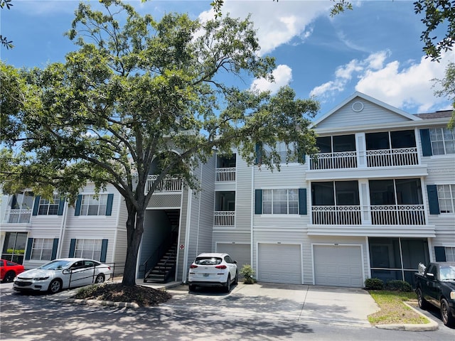 5017 City St Unit 1932, Orlando, FL 32839 - view of front of property with a garage and driveway