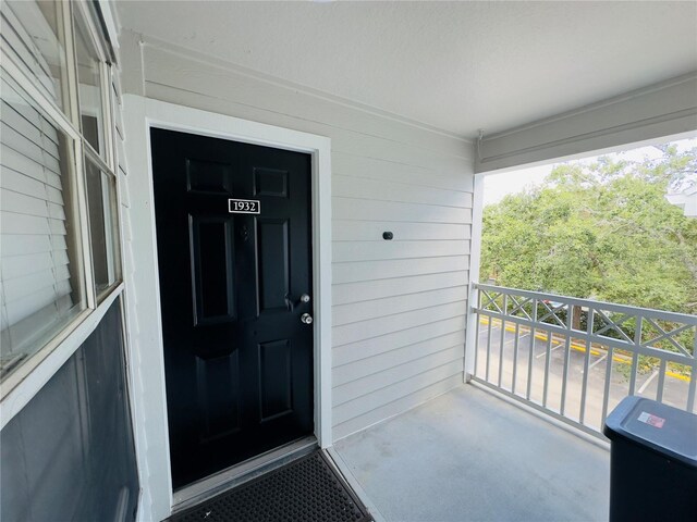 5017 City St Unit 1932, Orlando, FL 32839 - view of exterior entry with a balcony