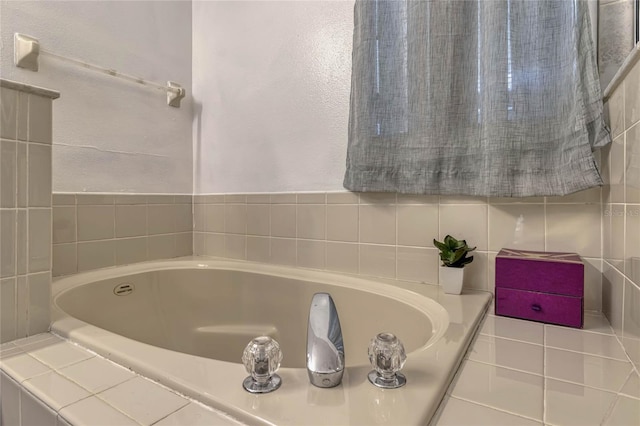 full bath with a relaxing tiled tub