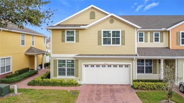4820 Battaglia Blvd, Saint Cloud, FL 34769 - view of front facade featuring a garage