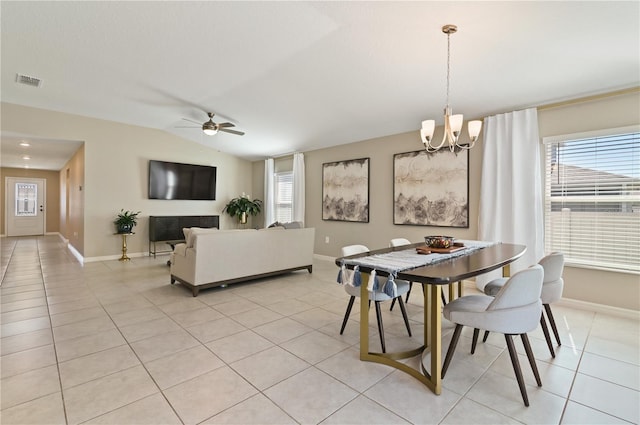 1546 Park Leah Cir, Apopka, FL 32712 - dining room featuring light tile patterned floors, lofted ceiling, ceiling fan with notable chandelier, visible vents, and baseboards