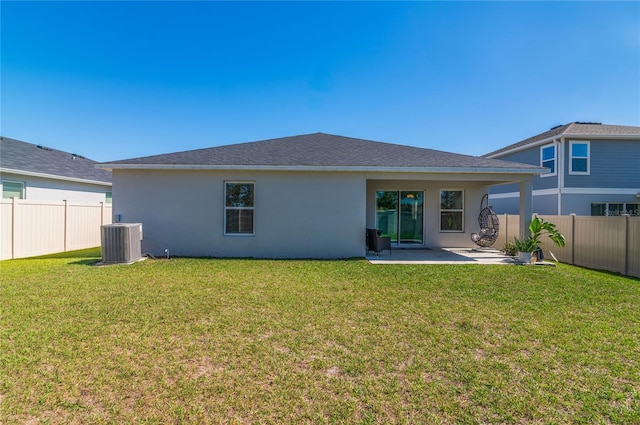 1546 Park Leah Cir, Apopka, FL 32712 - back of property with a fenced backyard, a lawn, cooling unit, and stucco siding