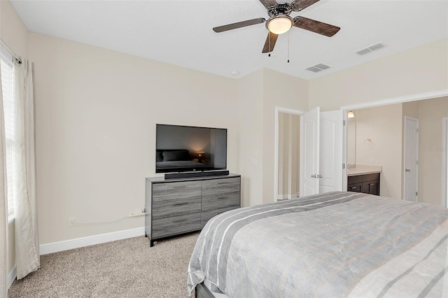 bedroom with baseboards, a ceiling fan, visible vents, and light colored carpet