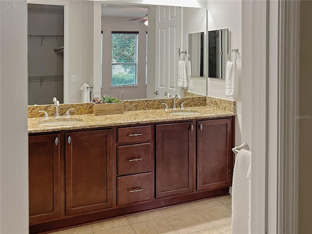 bathroom with ceiling fan, vanity, and tile patterned floors