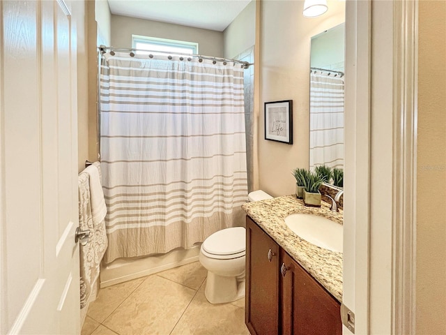 full bathroom featuring toilet, tile patterned flooring, shower / tub combo with curtain, and vanity