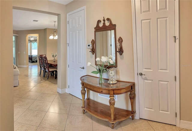 interior space featuring light tile patterned floors