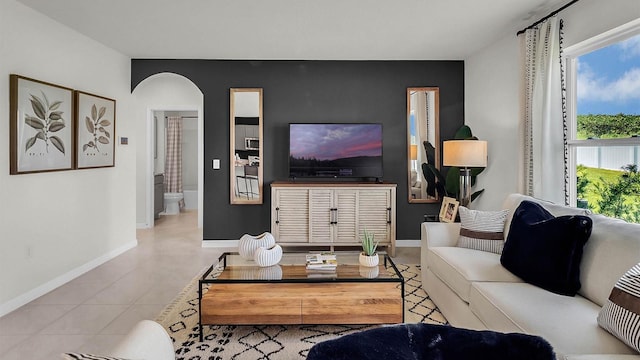 living room featuring light tile patterned flooring