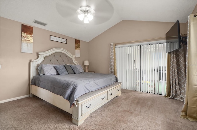 carpeted bedroom with lofted ceiling, ceiling fan, visible vents, and baseboards