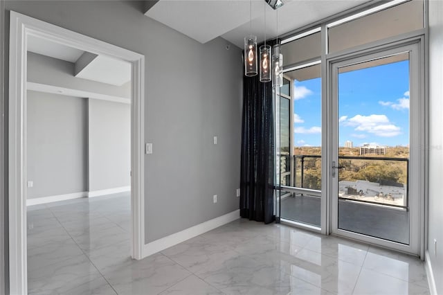 101 S Eola Dr Unit 1001, Orlando, FL 32801 - unfurnished dining area with a chandelier, marble finish floor, and baseboards