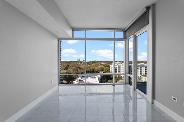 101 S Eola Dr Unit 1001, Orlando, FL 32801 - unfurnished sunroom featuring plenty of natural light