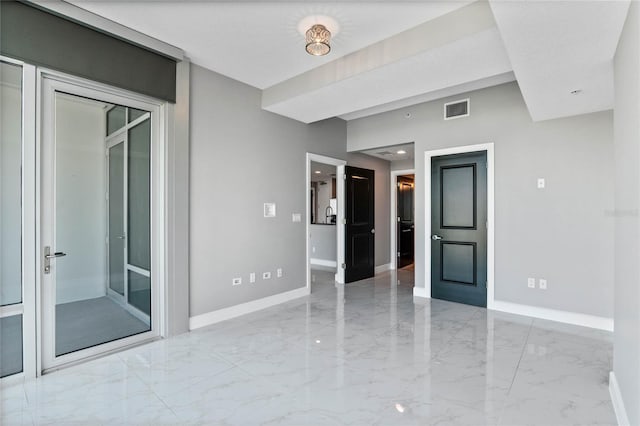 101 S Eola Dr Unit 1001, Orlando, FL 32801 - unfurnished room featuring visible vents, marble finish floor, and baseboards