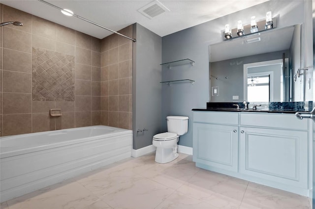 101 S Eola Dr Unit 1001, Orlando, FL 32801 - bathroom featuring visible vents, toilet, marble finish floor, baseboards, and bathing tub / shower combination
