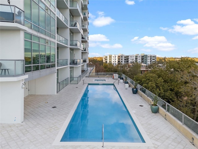 101 S Eola Dr Unit 1001, Orlando, FL 32801 - community pool with a patio area