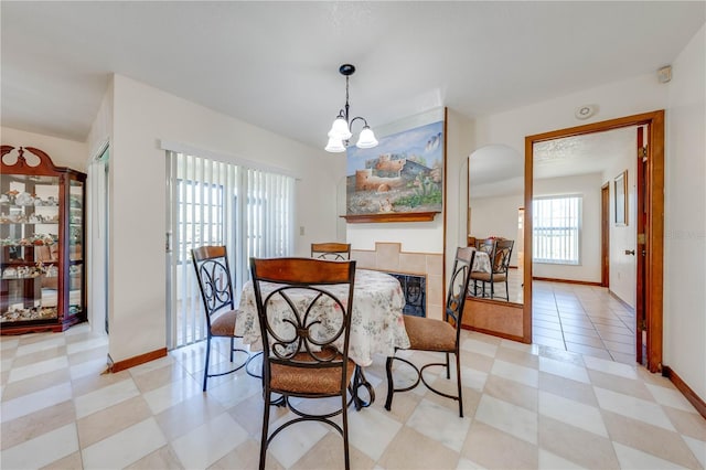 dining area featuring a chandelier