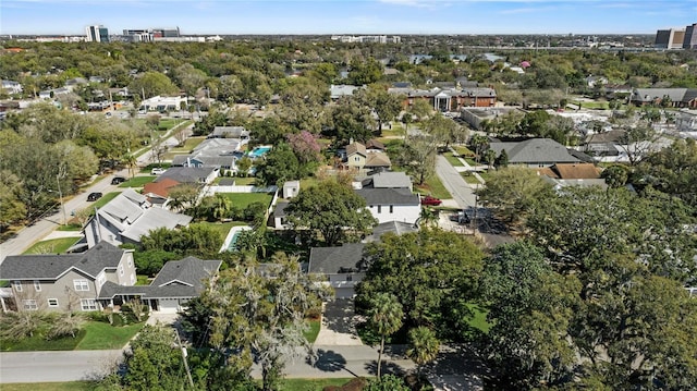 birds eye view of property with a residential view