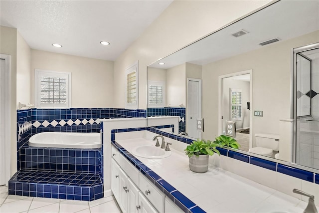 bathroom featuring toilet, recessed lighting, vanity, visible vents, and tile patterned floors