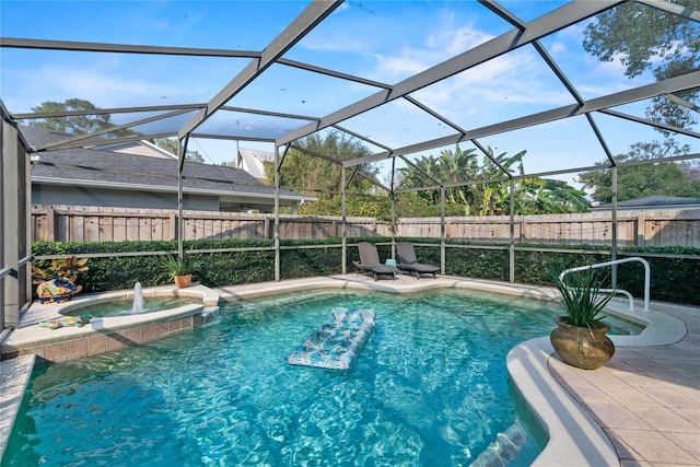 view of pool with a fenced in pool, a patio area, a fenced backyard, and a lanai