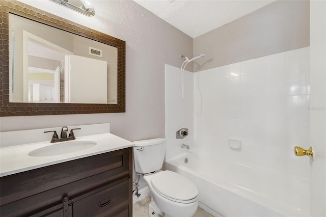 full bathroom featuring toilet, bathtub / shower combination, and vanity