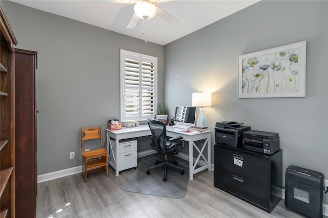 office with ceiling fan and wood-type flooring