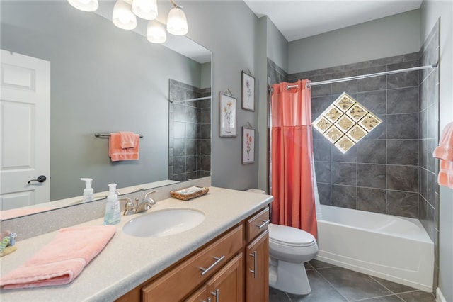 full bathroom featuring vanity, tile patterned flooring, toilet, and shower / tub combo