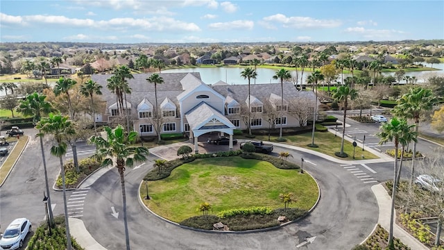 birds eye view of property featuring a water view