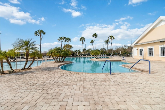 view of swimming pool featuring a patio