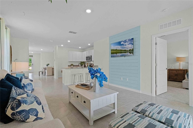 living room featuring light tile patterned floors