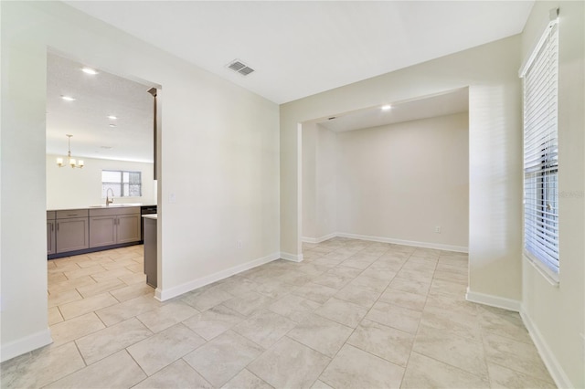 15088 Night Heron Dr, Winter Garden, FL 34787 - unfurnished room with a chandelier, recessed lighting, and light tile patterned floors