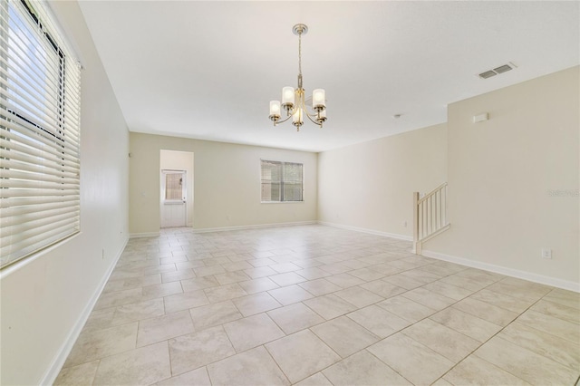 15088 Night Heron Dr, Winter Garden, FL 34787 - spare room featuring a chandelier and light tile patterned flooring