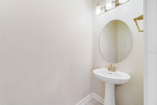 15088 Night Heron Dr, Winter Garden, FL 34787 - bathroom featuring baseboards and tile patterned floors