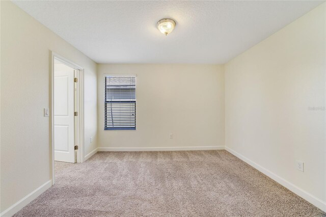15088 Night Heron Dr, Winter Garden, FL 34787 - unfurnished room with light carpet and baseboards
