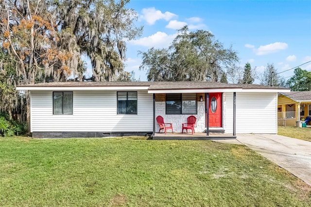 ranch-style house with a front yard and a porch