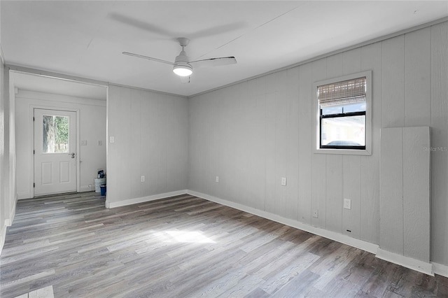 spare room featuring ceiling fan and wood-type flooring