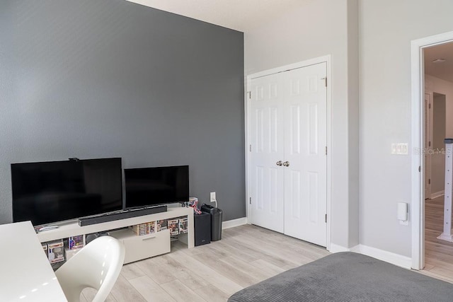 office with baseboards and wood finished floors