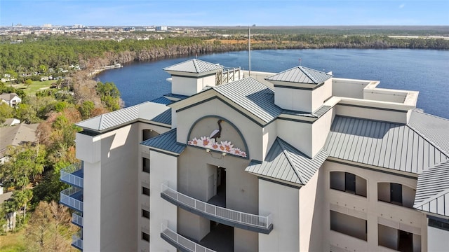 exterior space with a water view