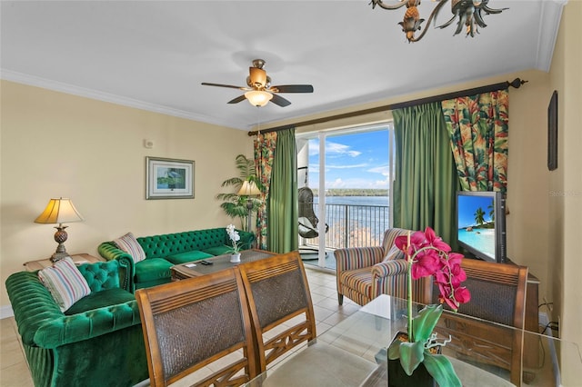 living area featuring ornamental molding, light tile patterned flooring, and ceiling fan