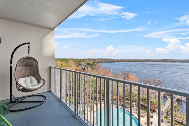 balcony featuring a water view