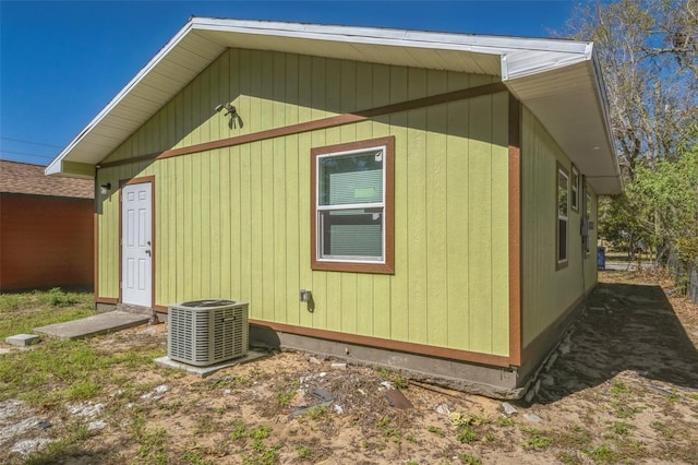 view of side of property featuring cooling unit