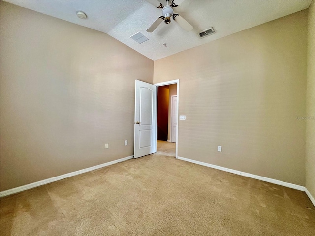 6640 S Goldenrod Rd Unit 118B, Orlando, FL 32822 - unfurnished room featuring light carpet, baseboards, lofted ceiling, ceiling fan, and a smoke detector