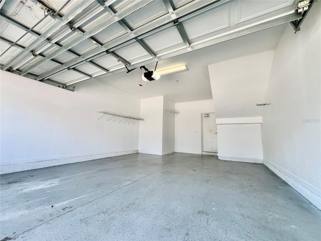 6640 S Goldenrod Rd Unit 118B, Orlando, FL 32822 - garage with a garage door opener and baseboards
