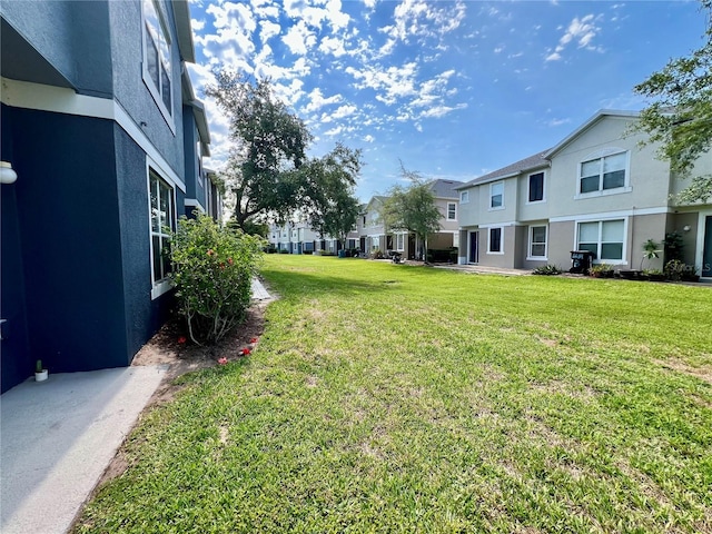 6640 S Goldenrod Rd Unit 118B, Orlando, FL 32822 - view of green lawn featuring a residential view