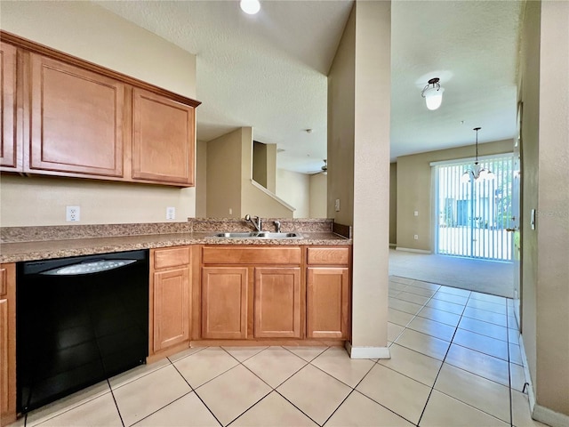 6640 S Goldenrod Rd Unit 118B, Orlando, FL 32822 - kitchen with dishwasher, a sink, light tile patterned flooring, baseboards, and light countertops